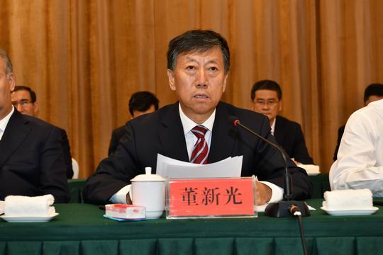 自治区人大常委会副主任、民建新疆第六届委员会主委董新光致开幕词并代表民建新疆第六届委员会作工作报告